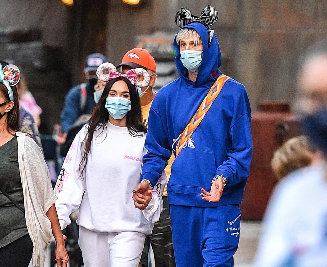 megan fox and boyfriend machine gun kelly visit disneyland with her parents and family in anaheim