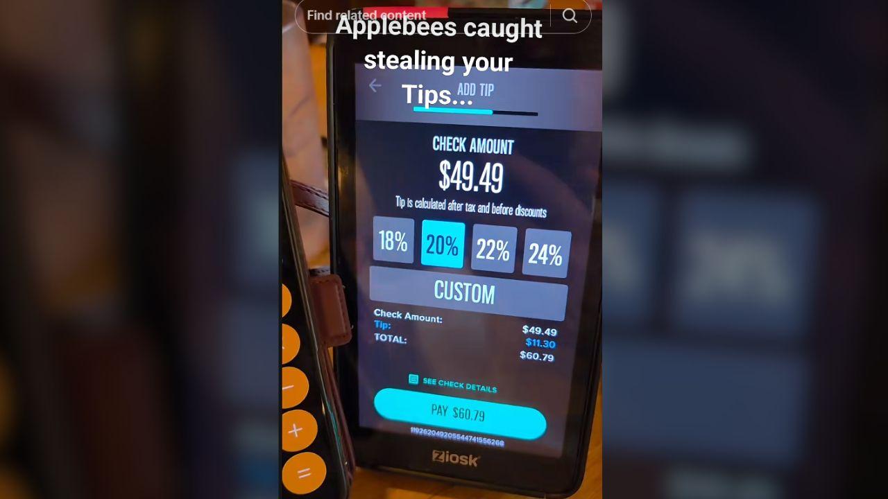 Image of Applebee’s electronic payment kiosk machine displayed suggested tip percentages for customers completing their bills.