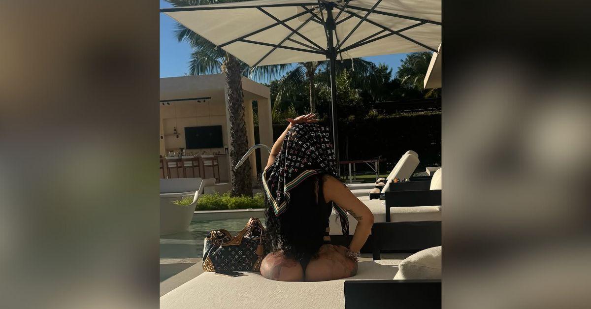 cardi b shows butt one piece black swimsuit hot photos