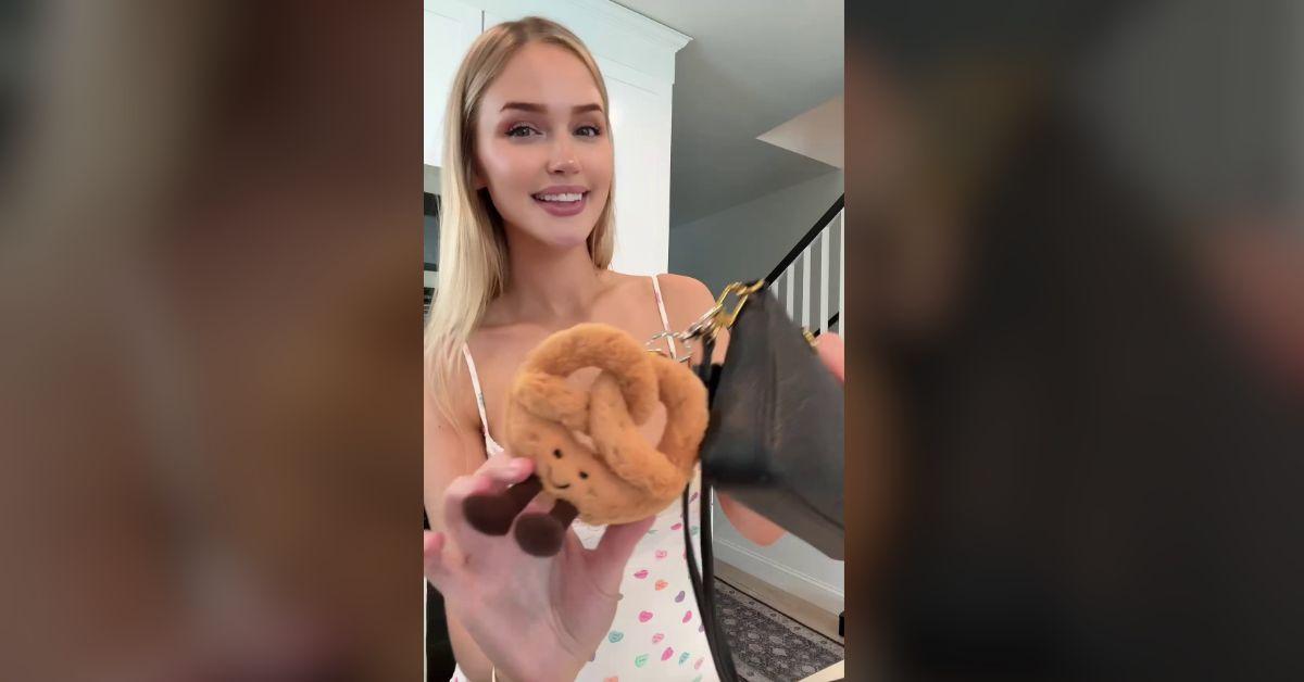 Tana Rain shows off her purse charm.