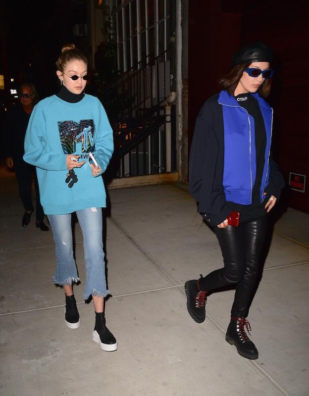 Gigi Hadid, Bella Hadid and Mohamed Hadid and Zayn Malik coming in and out of dinner in soho