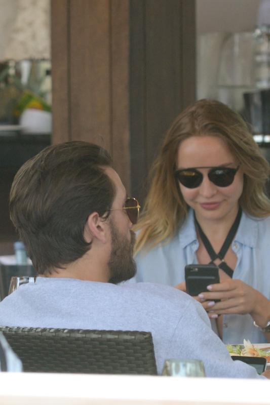 Scott Disick has lunch with his babe and friends by the beach in Miami