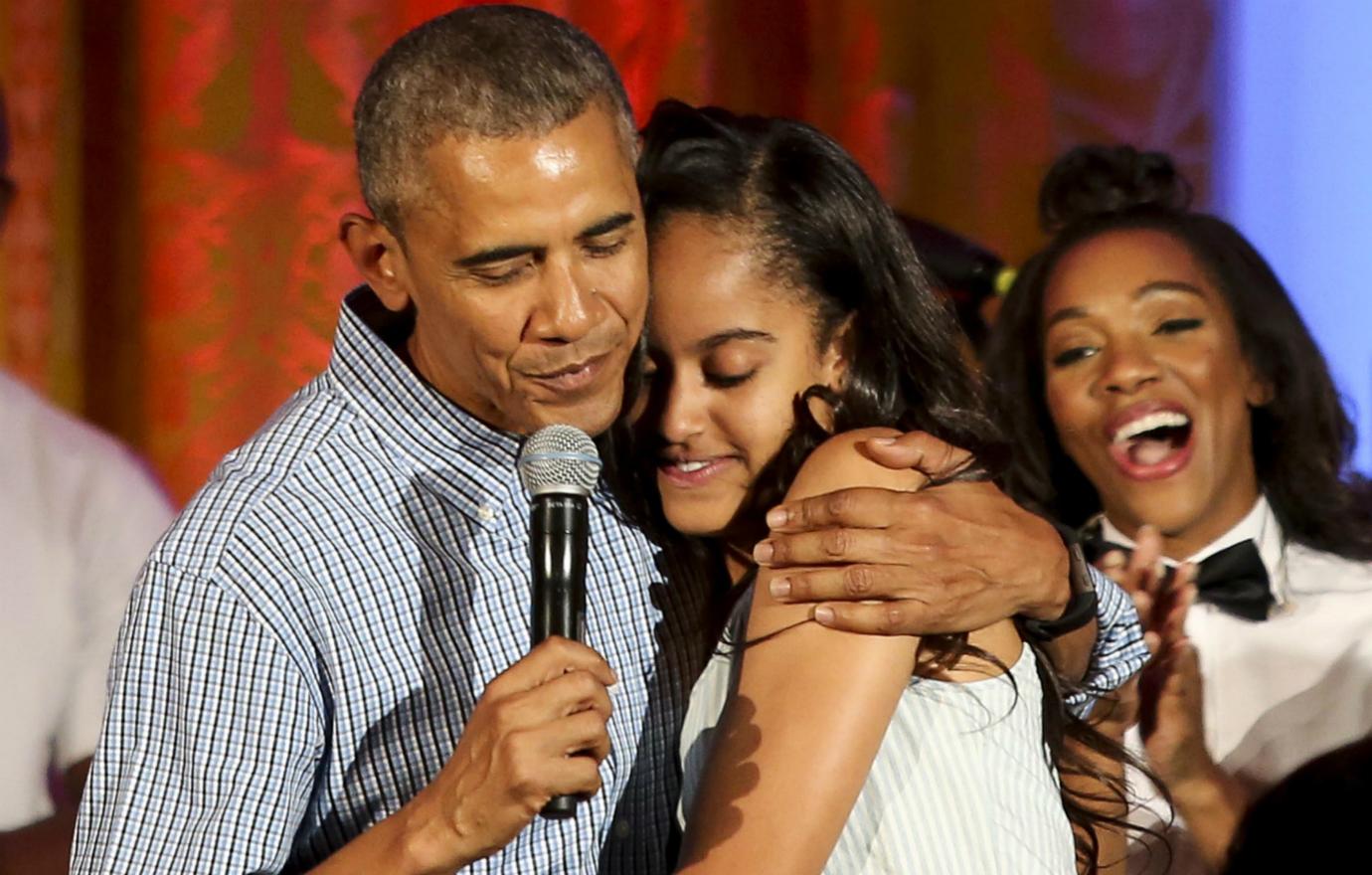 Malia Obama Life in and Out of the White House Hugging Barack