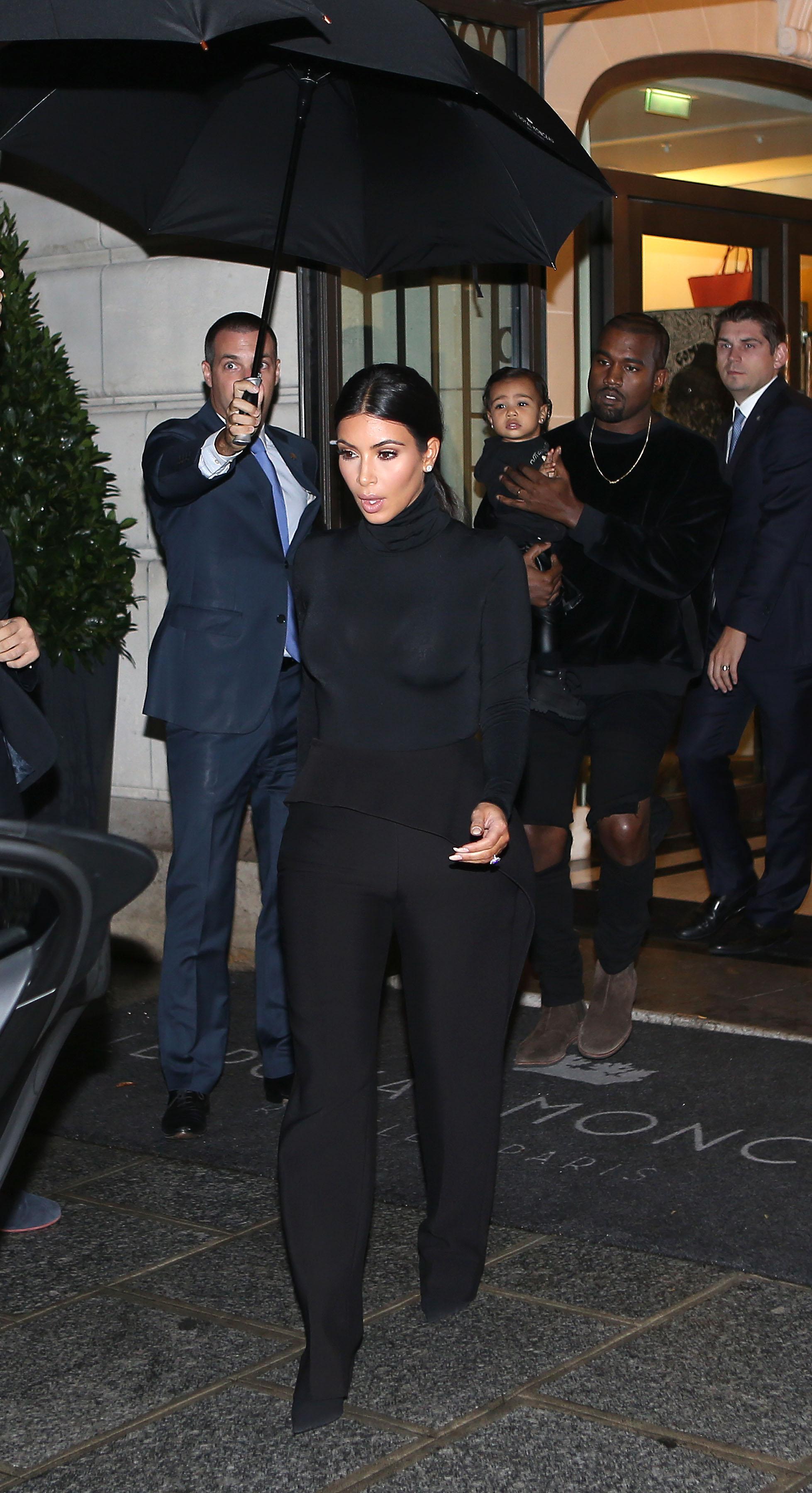 Kanye West, Kim Kardashian and North West attend Balenciaga Fashion Show during the Paris Fashion Week