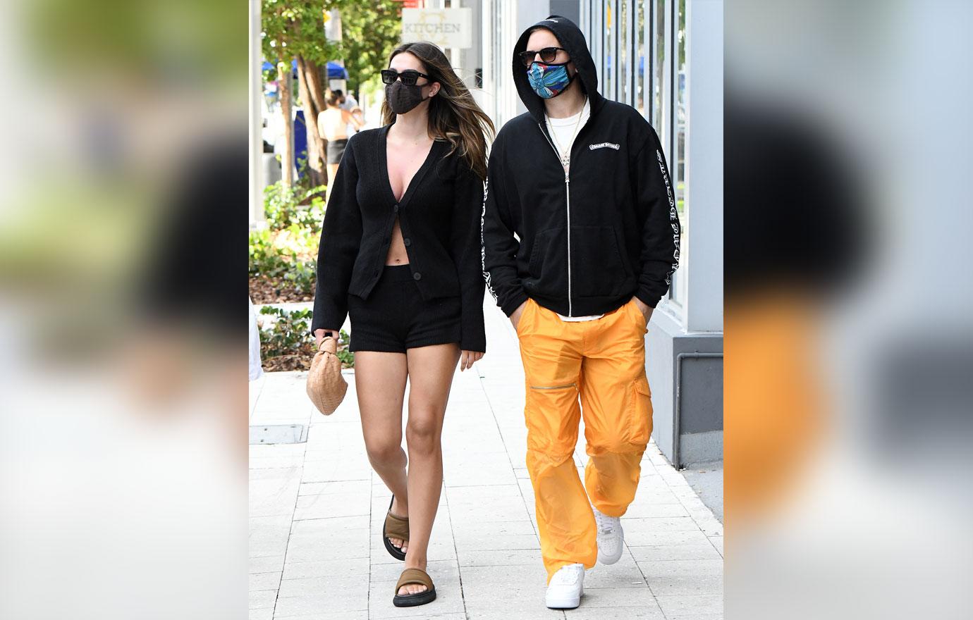 scott disick and girlfriend amelia hamlin color coordinate on beach in miami