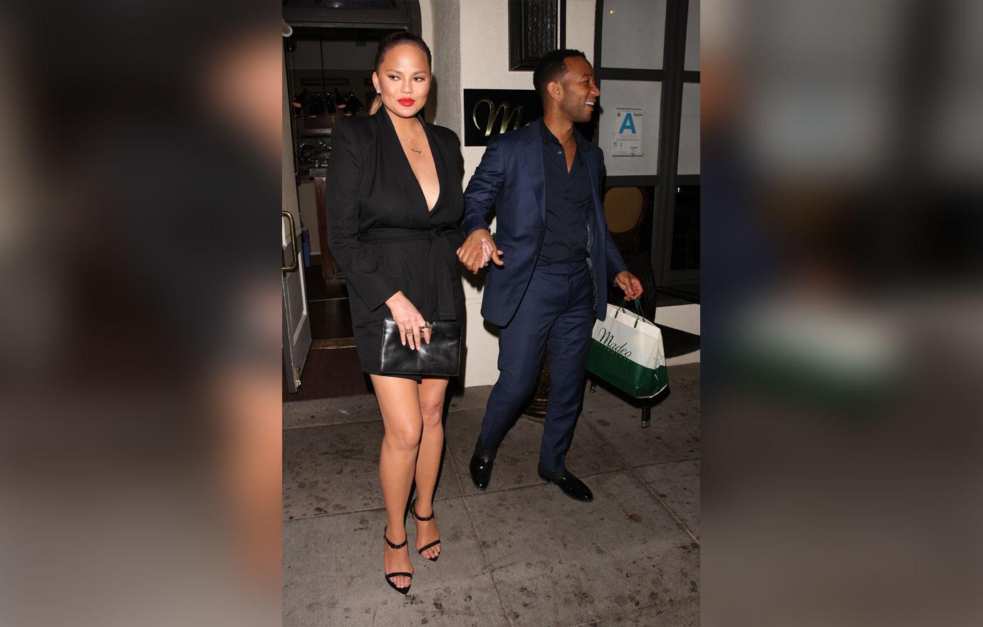 Chrissy Teigen and John Legend are spotted leaving Madeo restaurant hand in hand