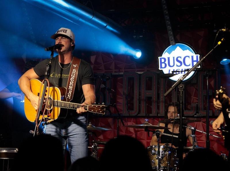 busch country one night only riley green live performance shot