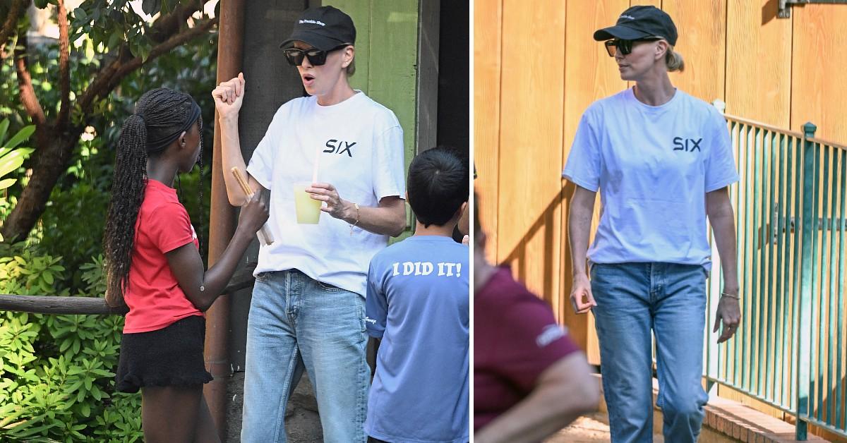 Photo of Charlize and Jackson Theron stopped to take a break during their Disneyland trip.