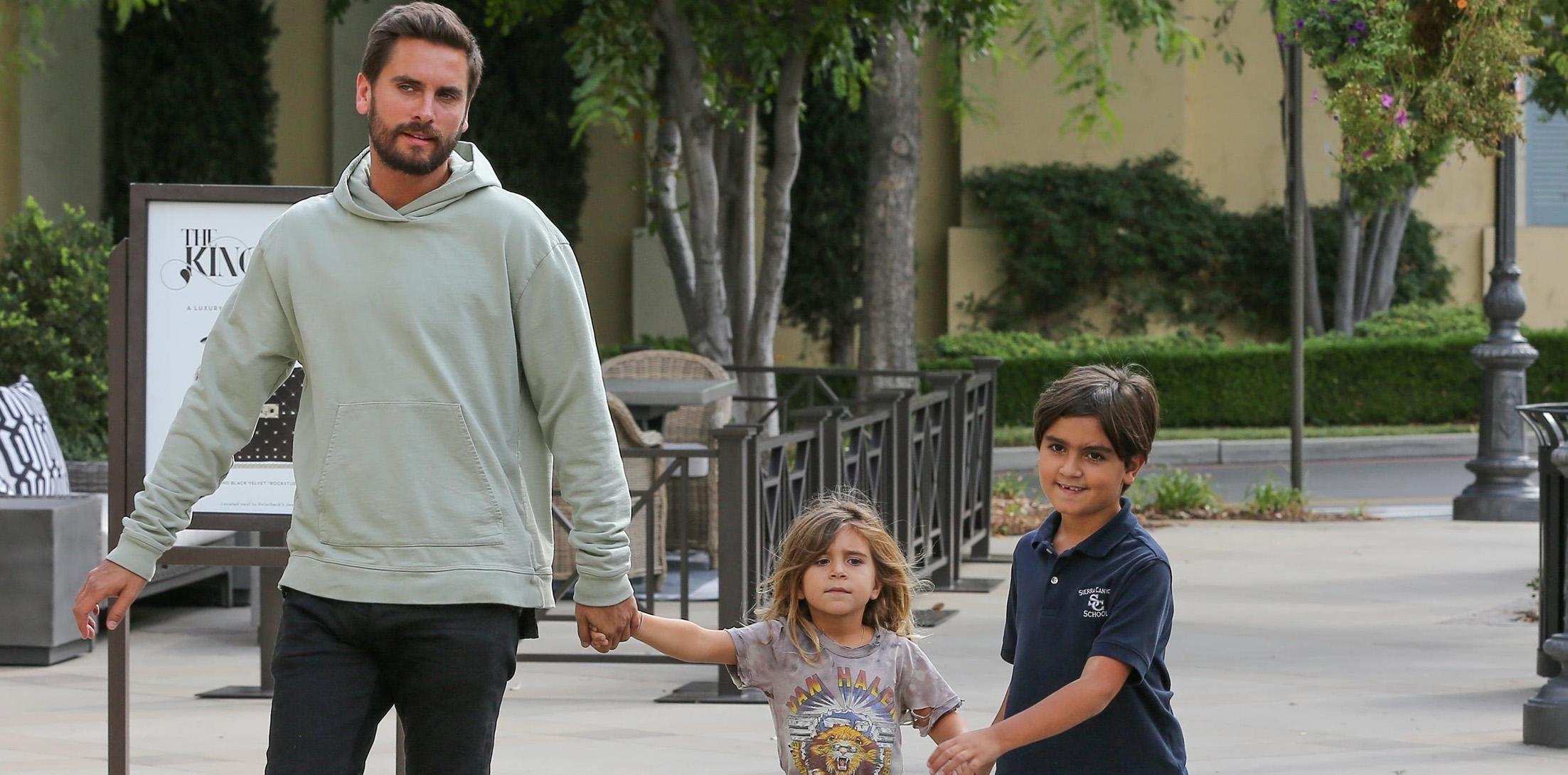 scott disick holding penelope