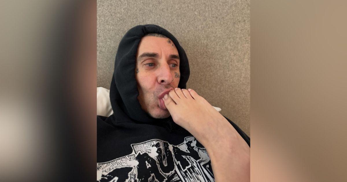 image of Travis Barker was slammed after posting a photo of himself kissing Kourtney Kardashian’s foot.