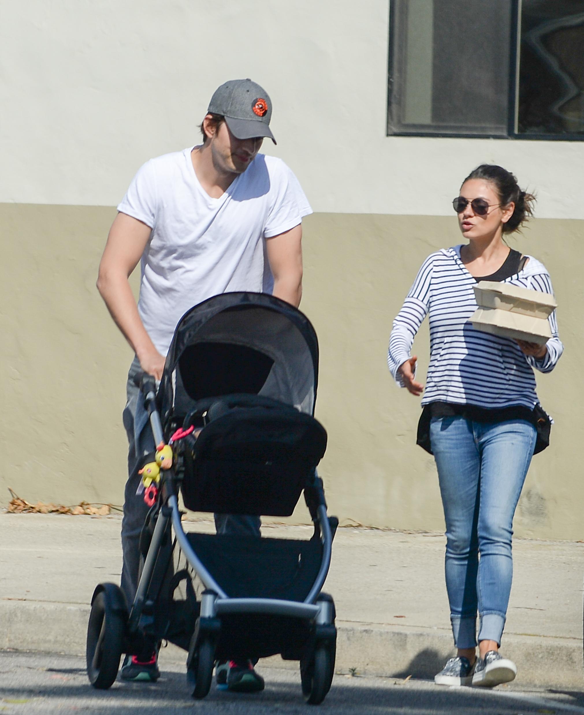 EXCLUSIVE: ** PREMIUM RATES APPLY** Mila Kunis and Ashton Kutcher take Wyatt to lunch in Carpinteria