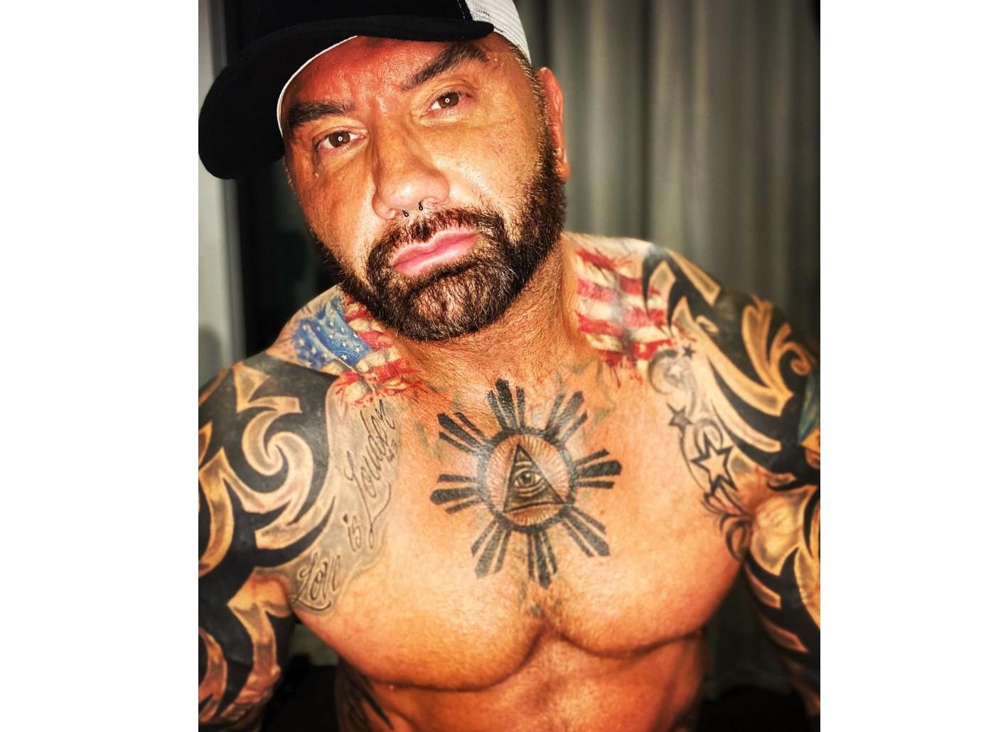 Former WWE Star Dave Bautista Strips Down At Photos