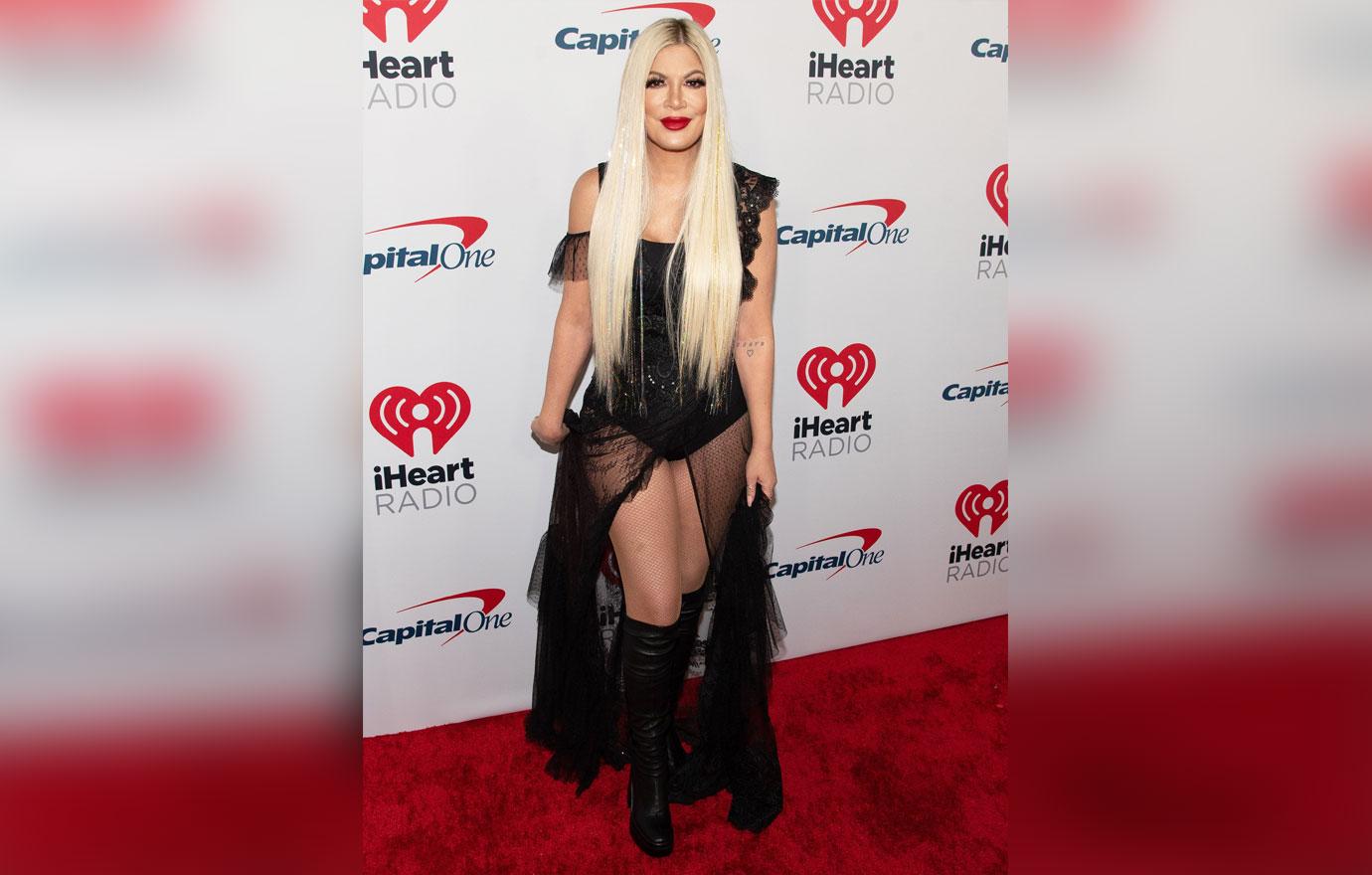 tori spelling slays red carpet solo appearance kiss fm jingle ball photos