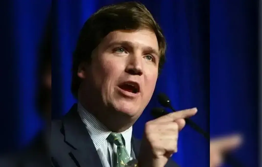 joe rogan defends his friend tucker carlson critics very odd bad guy