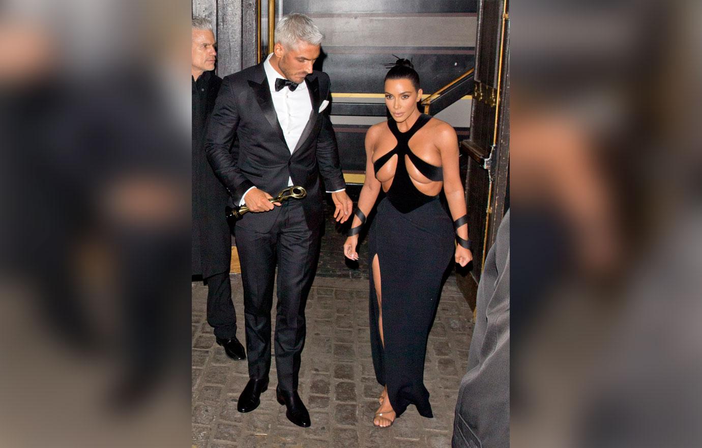 Kim Kardashian wears a &#8216;Barely There&#8217; dress as she was seen leaving  &#8216;The Avalon&#8217; in Hollywood with her British Hair Stylist Chris Appleton who was looking sharp in a Tuxedo and holding a Gold award