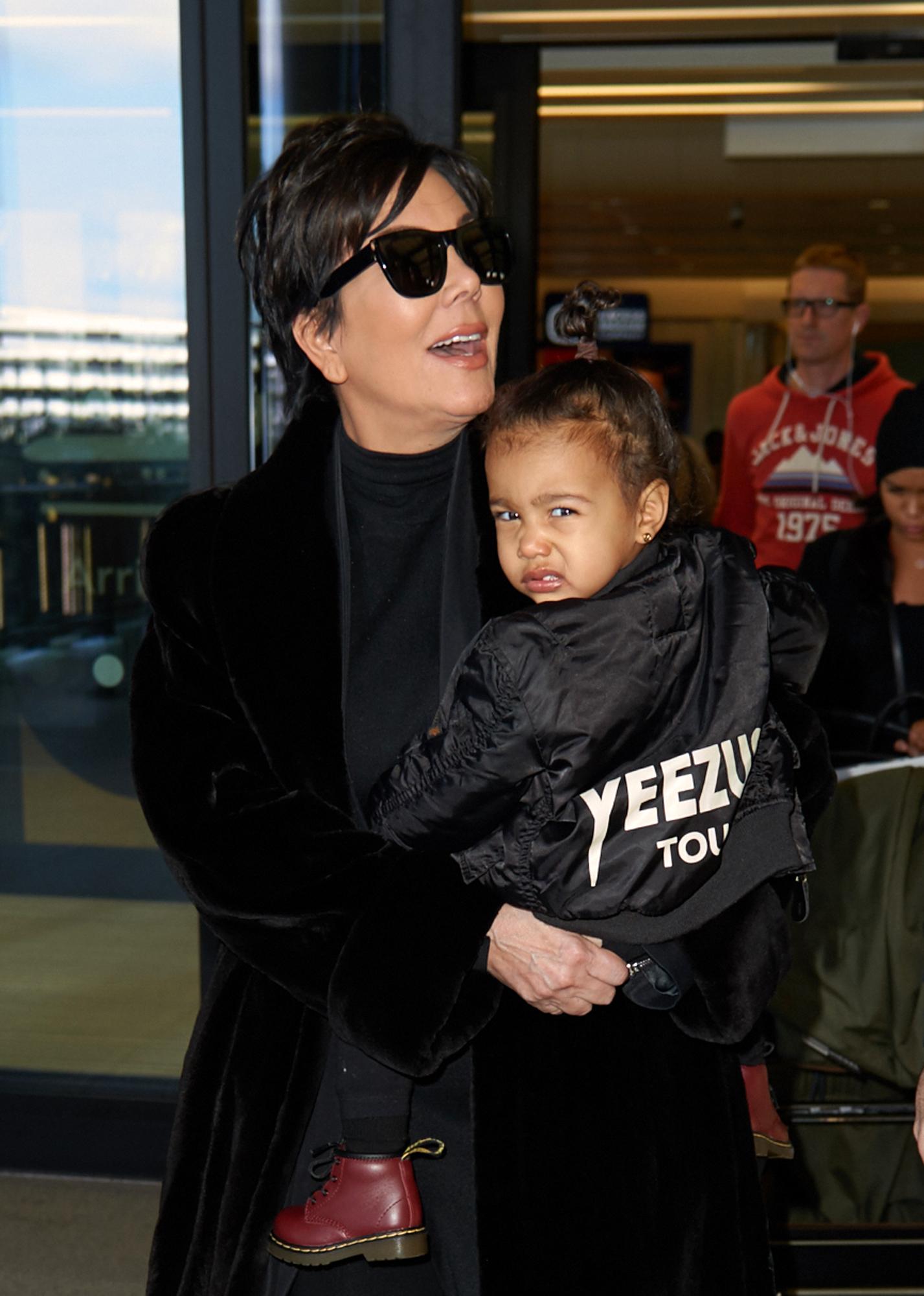 Kris Jenner and baby North West at Heathrow Airport