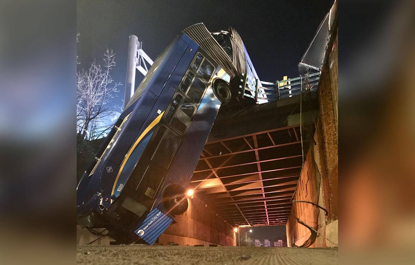 nyc bus hangs off overpass accident injuries