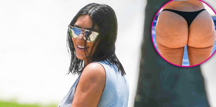 [PICS] Kim Kardashian Displays Curves In Barely-There Bikini Thong!