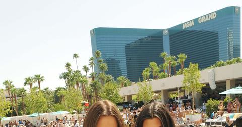 2009__08__kourtney_khloe kardashian_wet_republic_pool.jpg