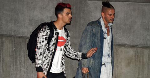joe jonas frowns looks sad blocked ocars after party