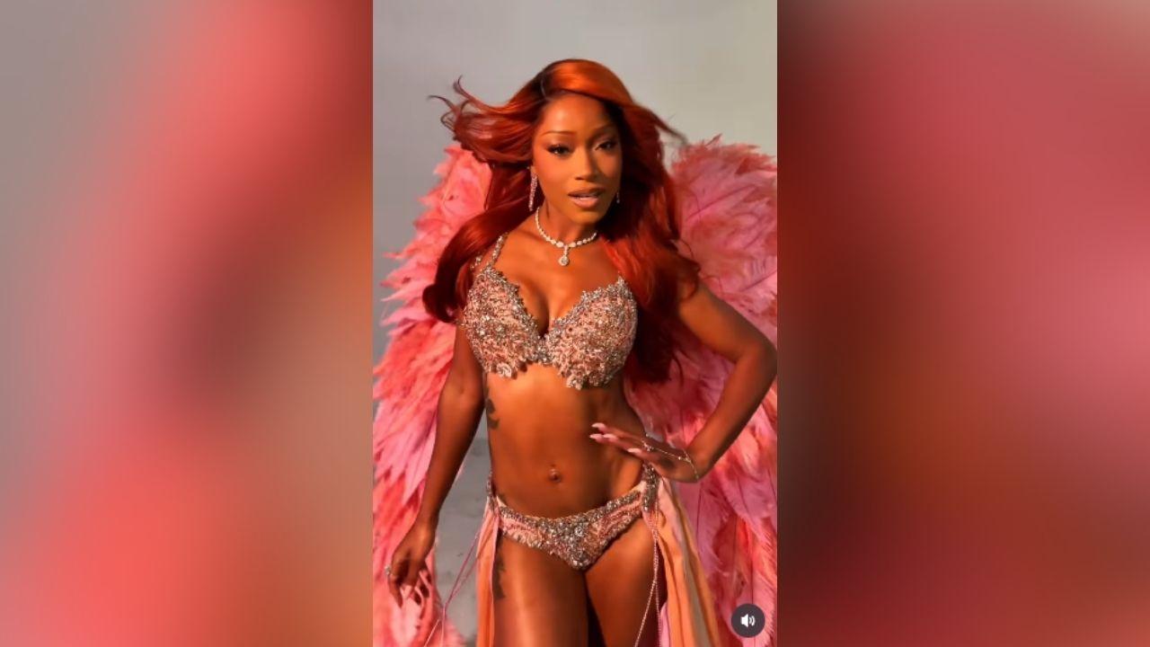 image of Keke Palmer celebrated Halloween by dressing up as a Victoria’s Secret Angel in a glamorous pink-winged costume.