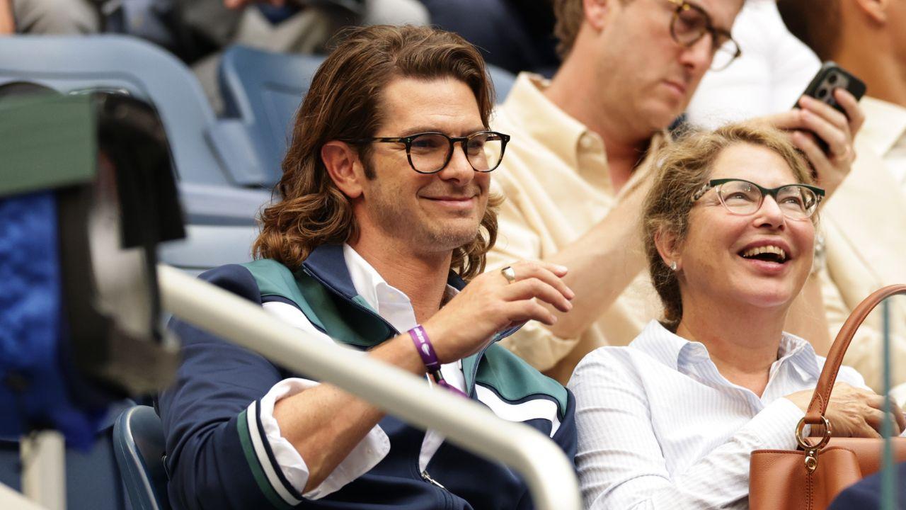 Image of Andrew Garfield was all smiles as he took in the championship action at Arthur Ashe Stadium.