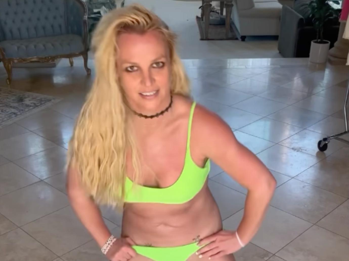 britney spears dancing skimpy neon bikini broken bone foot video