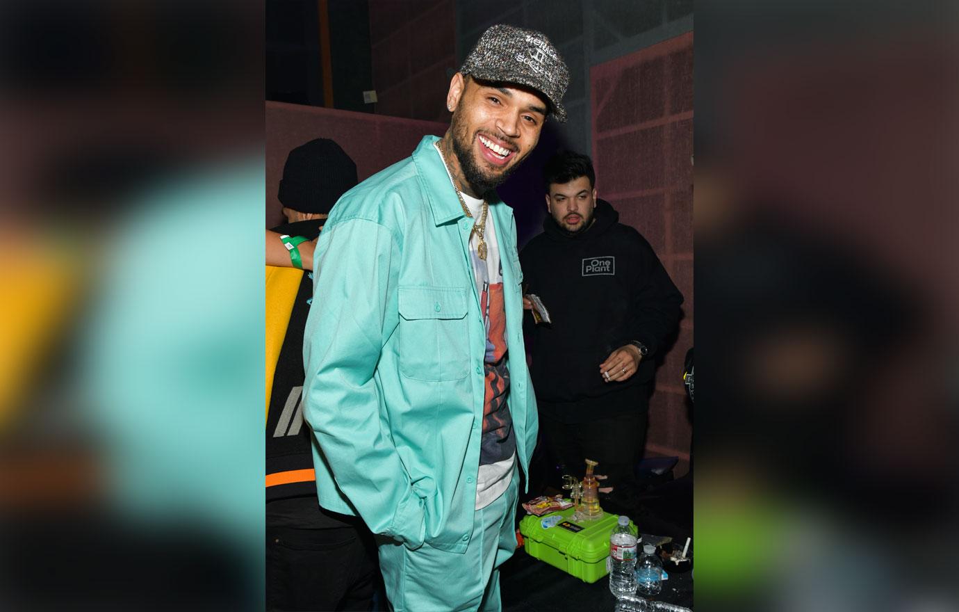 Chris Brown Smiling Wear A Light Blue Jean Jacket