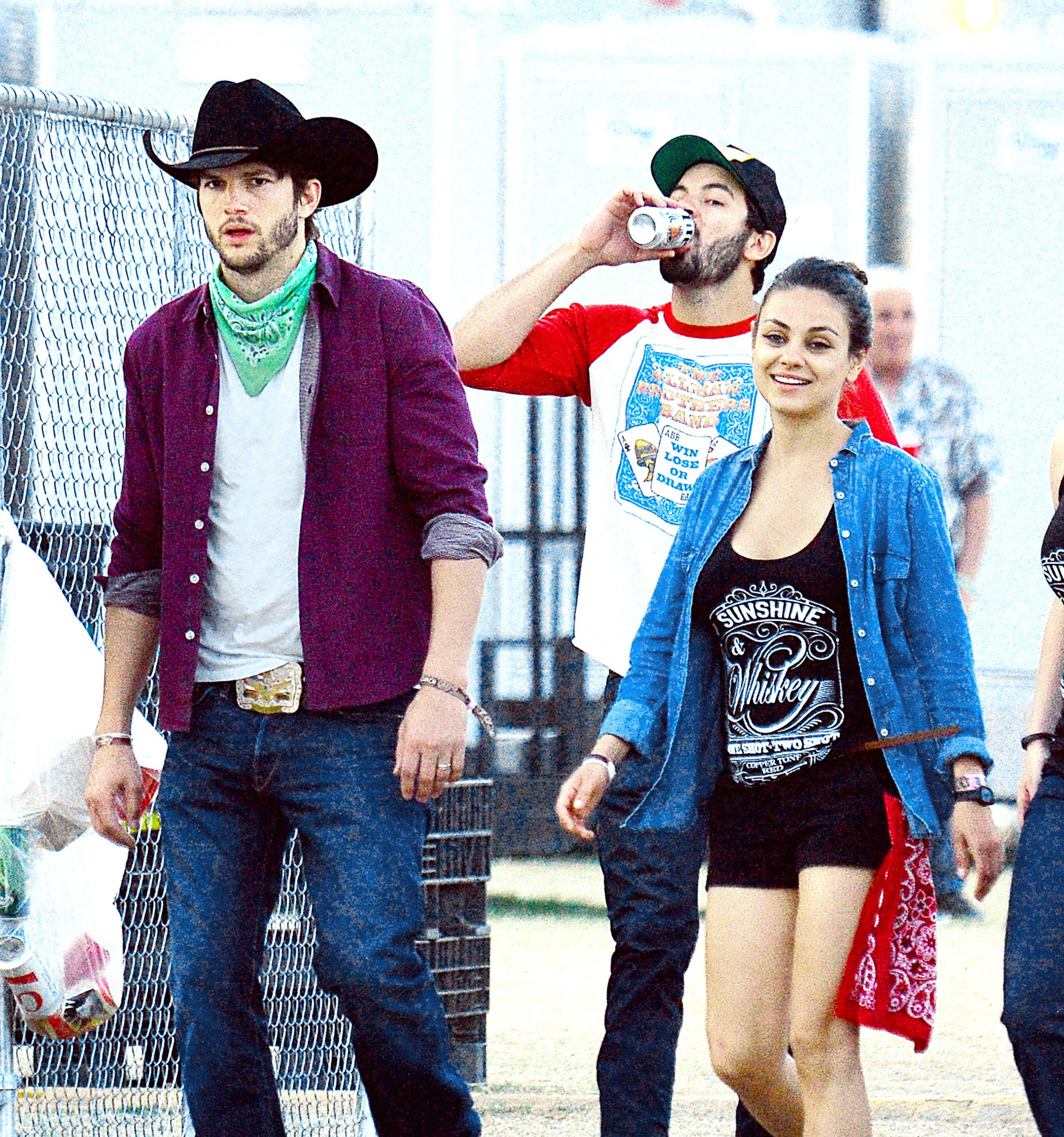 EXCLUSIVE: **PREMIUM RATES APPLY** Ashton Kutcher and Mila Kunis spotted enjoying the weekend at Stagecoach Country Music Festival in Indio, CA.