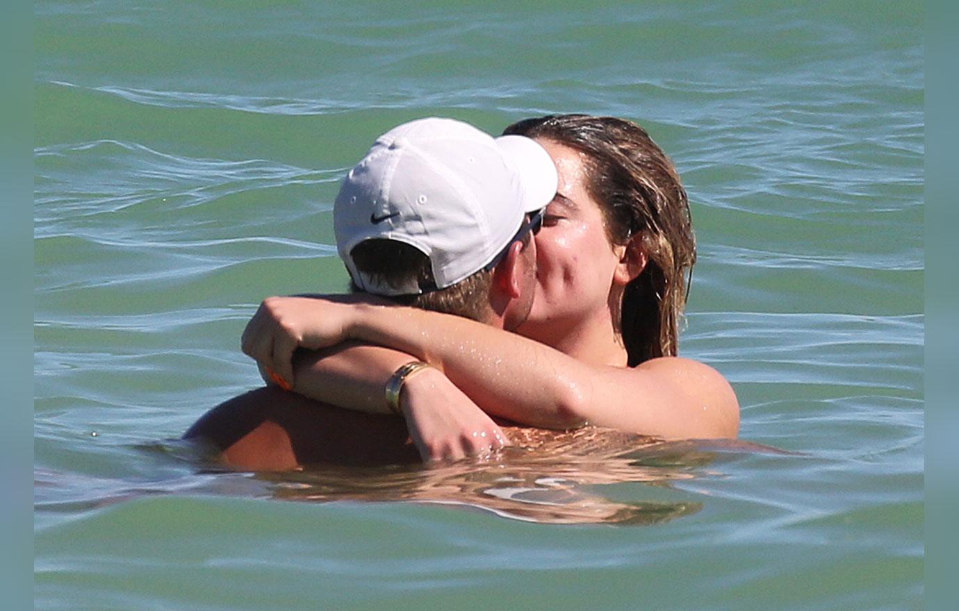 Brielle Biermann and boyfriend kiss for fairground photos