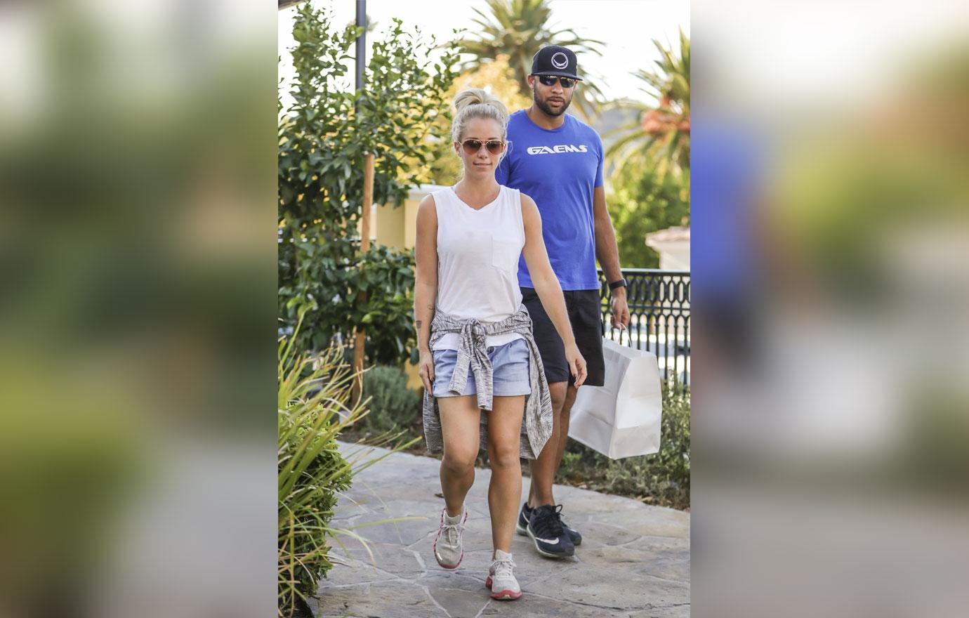 *EXCLUSIVE* Kendra Wilkinson spends time with Hank Baskett without her wedding ring on