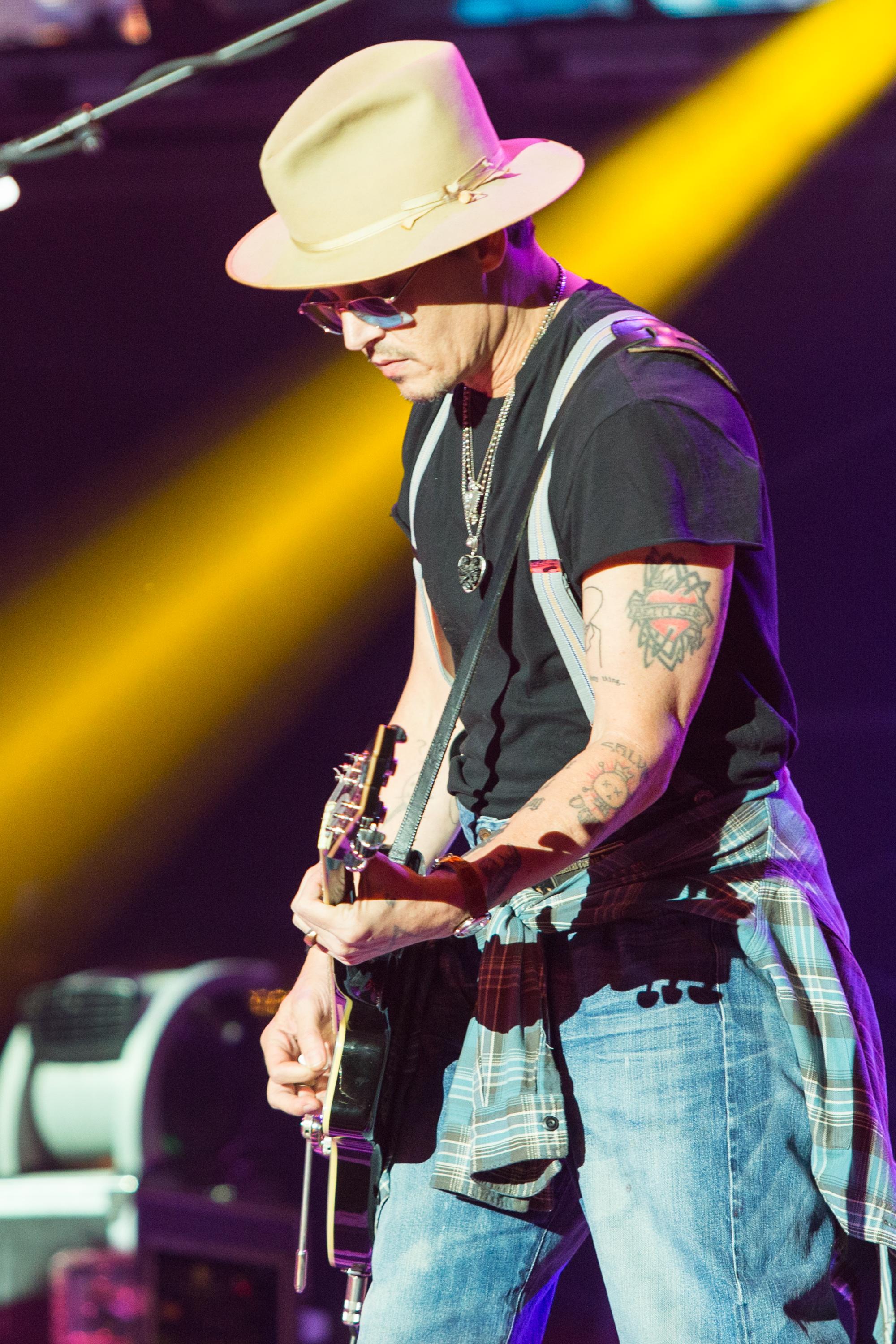 Johnny Depp performs with Aerosmith in Los Angeles