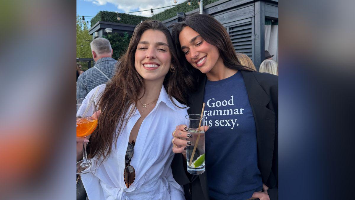 Image of Dua Lipa posed with her lookalike sister.