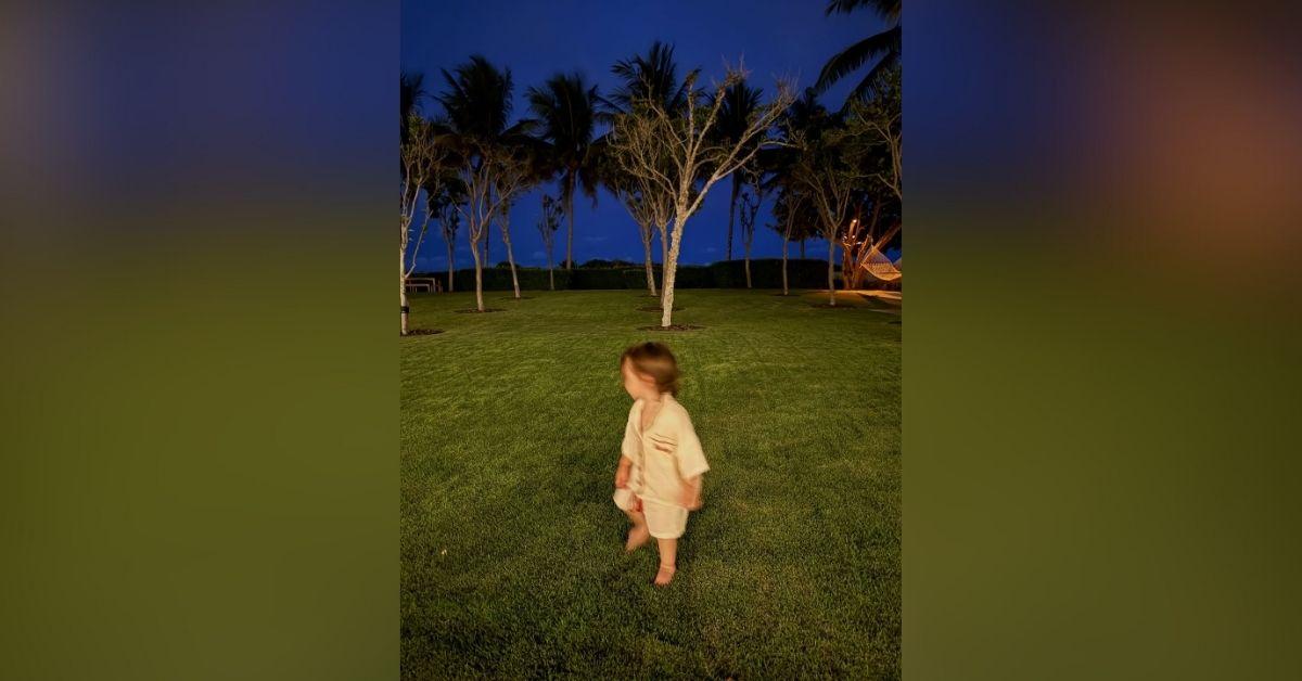 image of The reality star posted a photo of Rocky strolling barefoot in the grass.