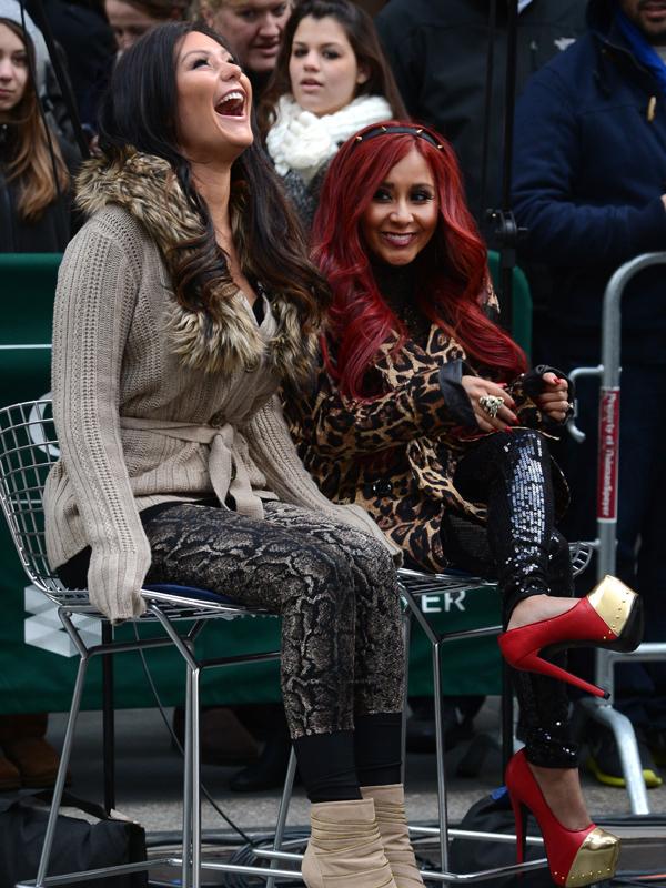 Snooki looks like the dog's dinner as Jersey Shore co-star JWoww takes pet  pooches for walkies