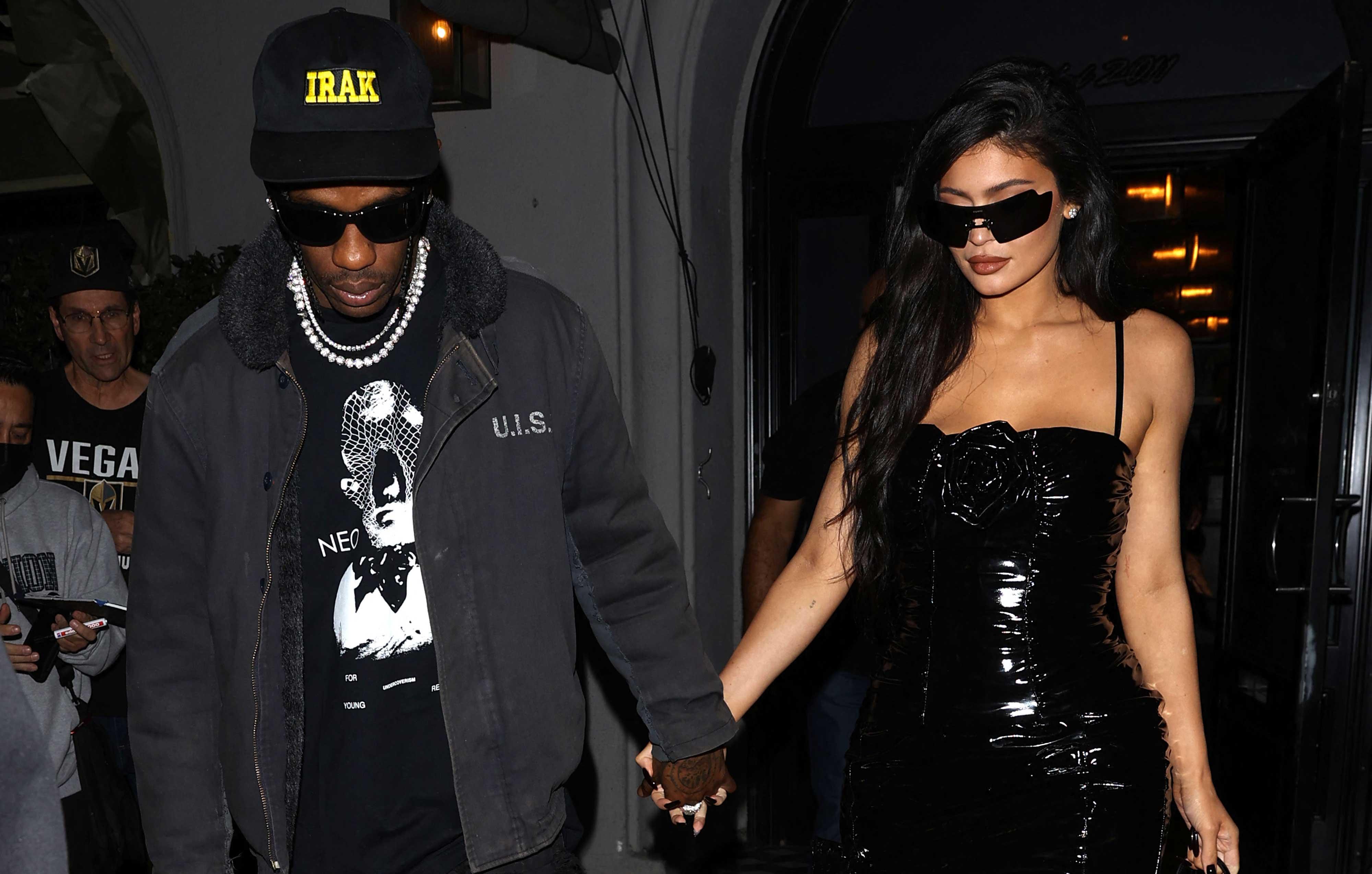 Kylie Jenner stuns in a black mini dress during a date night with Travis  Scott at