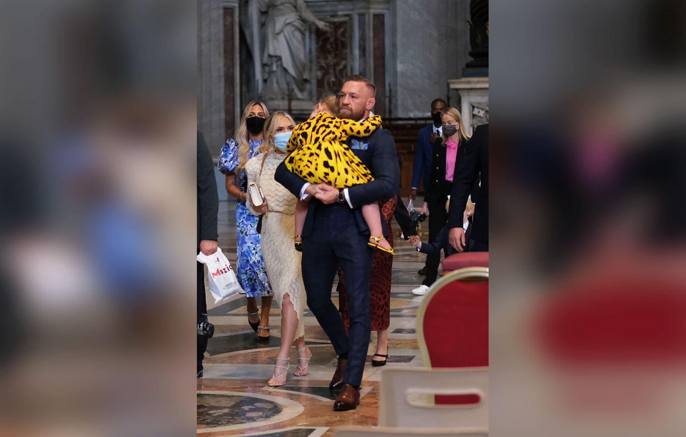 conor mcgregor and wife are spotted inside the vatican for the christening of son