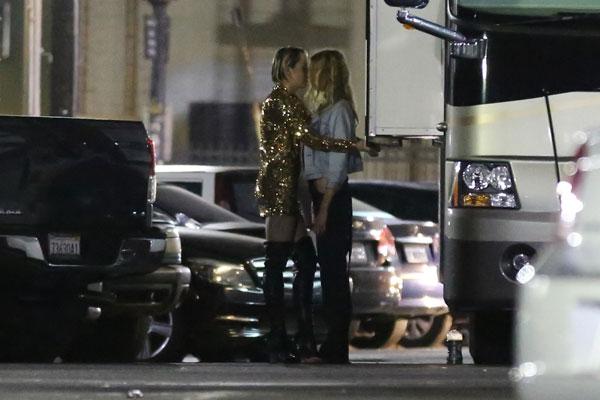 *PREMIUM EXCLUSIVE* **NO WEB, WEB EMBARGO UNTIL 1PM PST ON JULY 02, 2015**  Miley Cyrus spotted passionately kissing blonde Victoria&#8217;s Secret Angel Stella Maxwell *MUST CALL FOR PRICING*