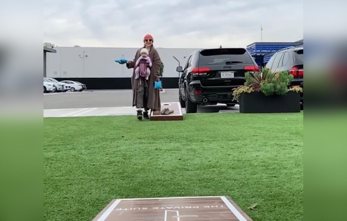 kate hudson danny fujikawa corn hole