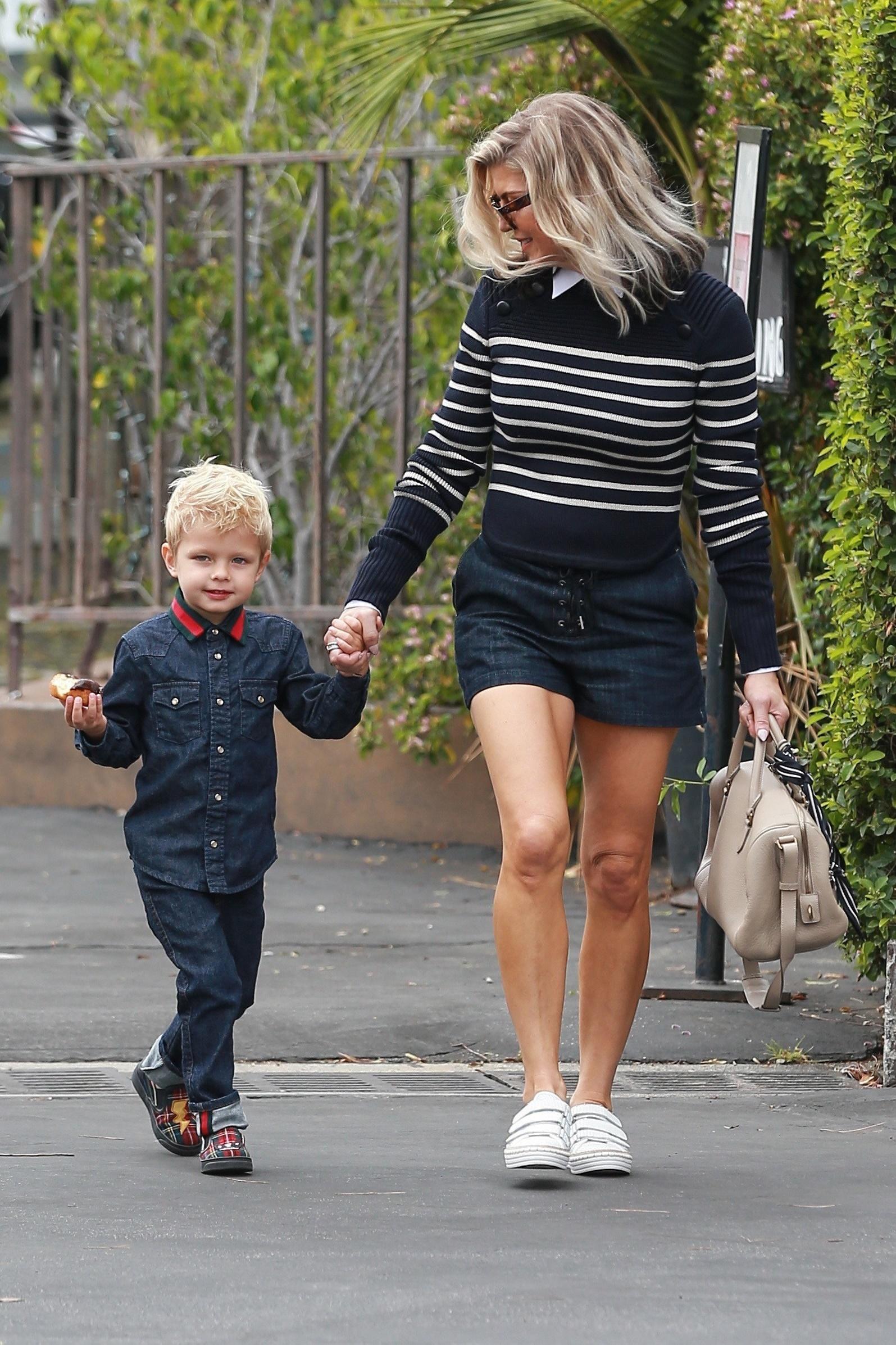 Fergie and Axl coordinate their looks for church