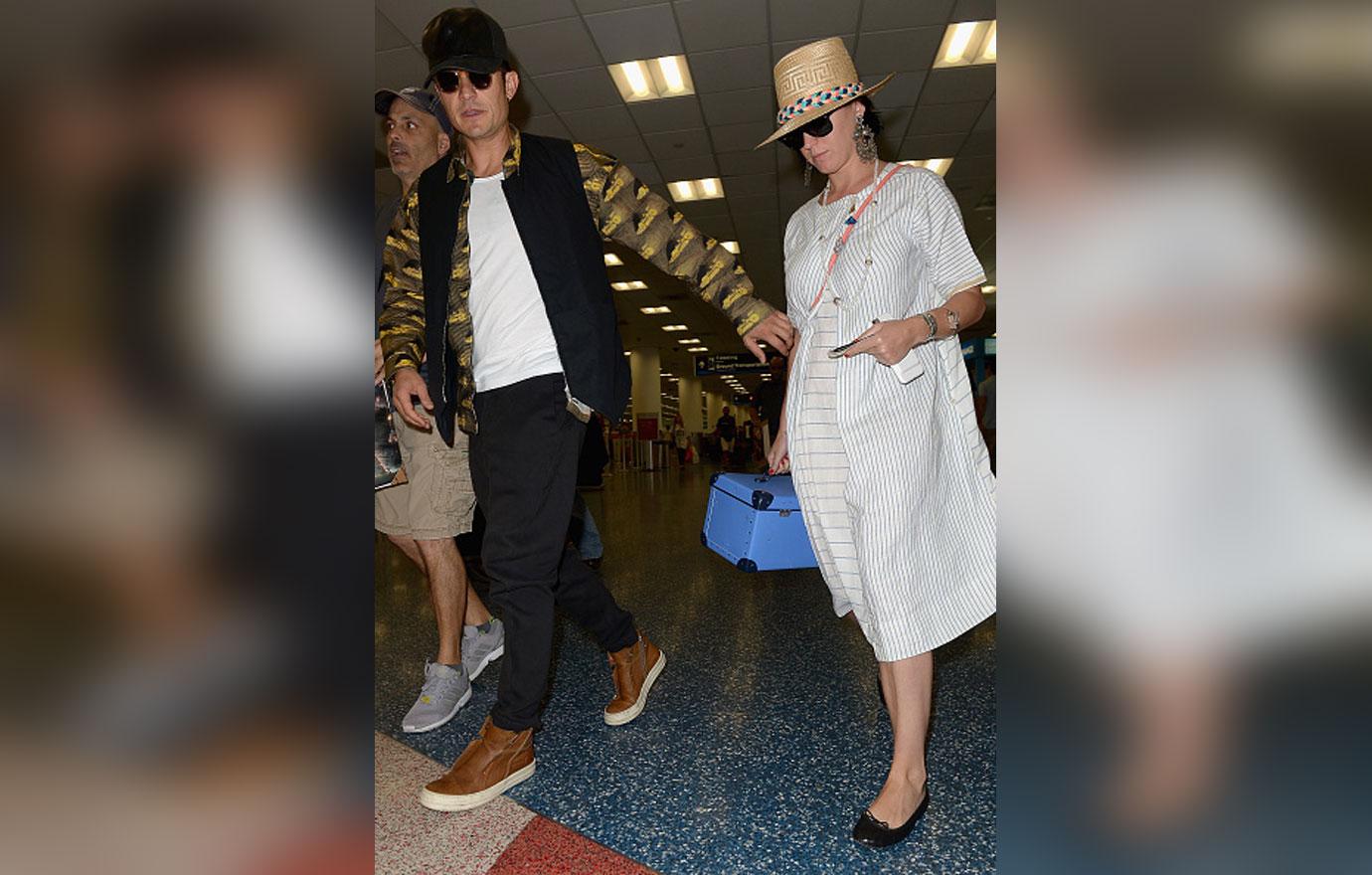 Katy Perry And Orlando Bloom Sighting At Miami International Airport