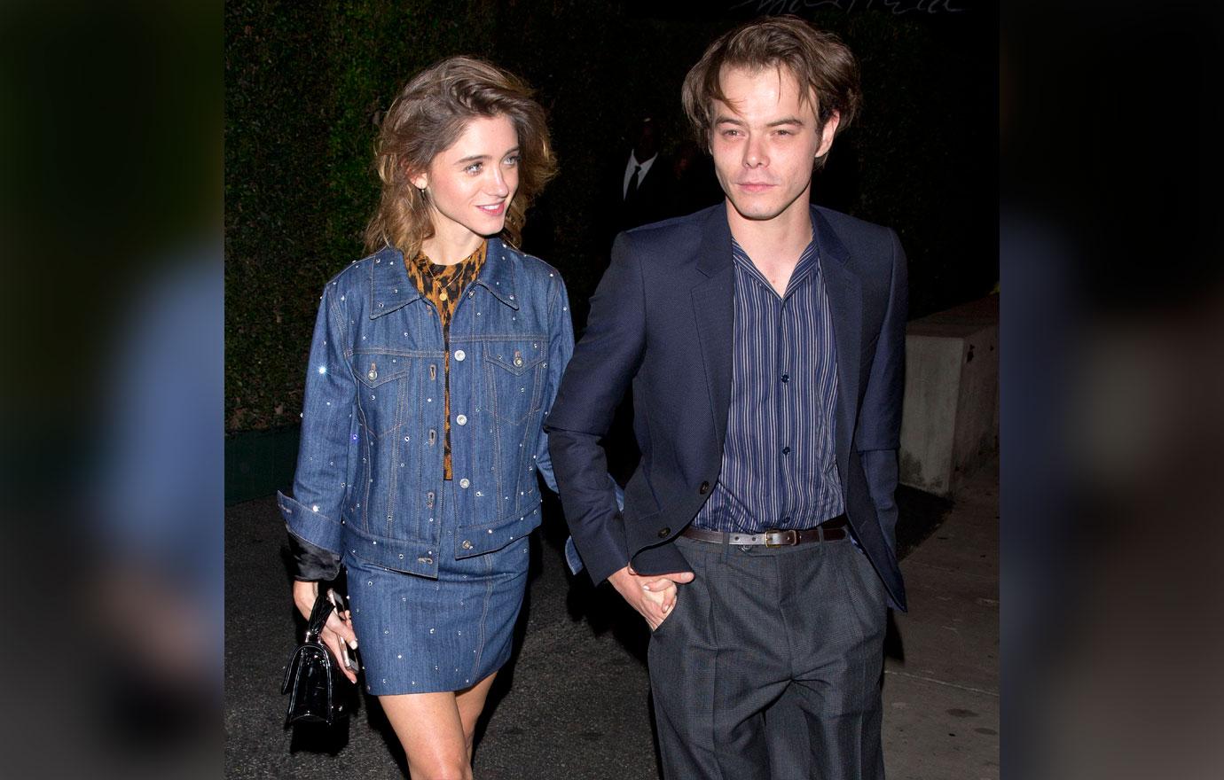 Natalia Dyer and Charlie Heaton hold hands as they leave the &#8216;MIU MIU&#8217; clothing launch in West Hollywood, CA