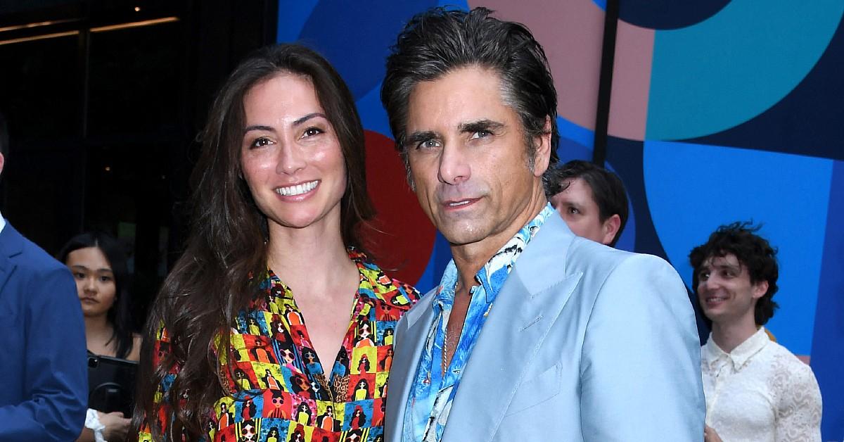 Photo of Caitlin McHugh and John Stamos.