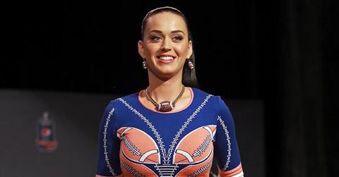 Katy Perry throws a football at the Super Bowl Halftime Show Press Conference