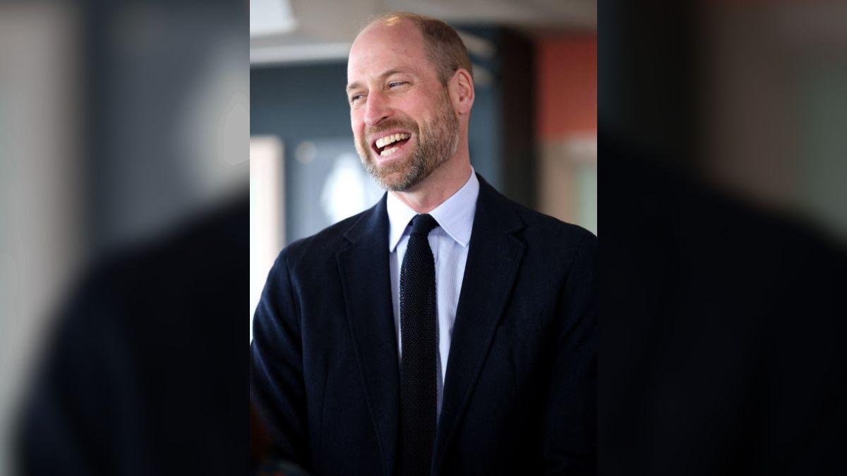 Photo of Prince William was zooming his camera in on the field when a phone call disrupted his screen.