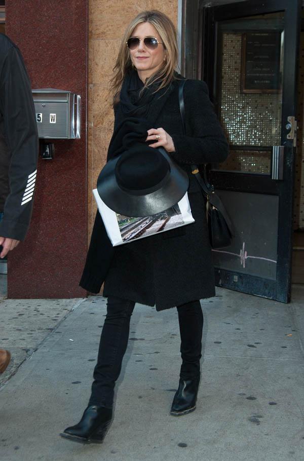 Jennifer Aniston is all smiles leaving Yoga class in New York City