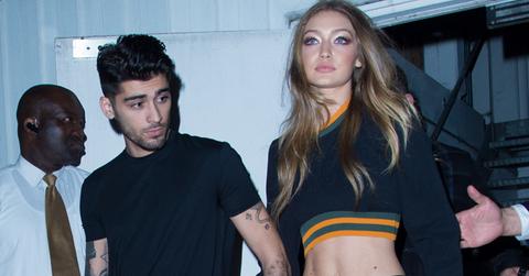 Gigi Hadid and Zayn Malik hold hands while leaving Versus Versace show in London
