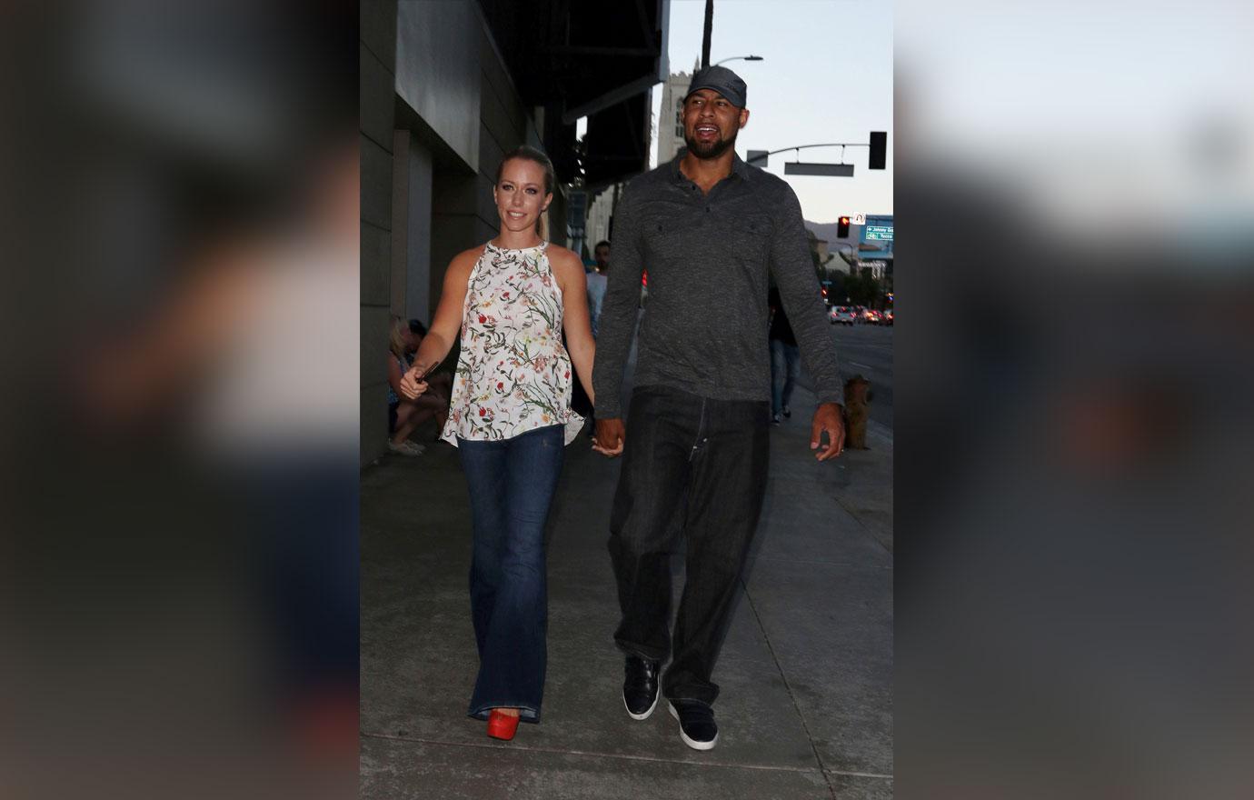 Kendra Wilkinson and Hank Baskett hold hands at Lucky Strike Bowling Alley