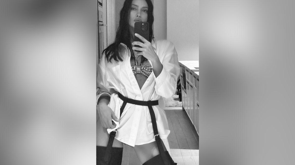 Image of Irina Shayk's Met Gala outfit was decked out with watches.