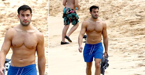 britney spears boyfriend sam asghari takes a solo stroll on the beach while on vacation in maui ok